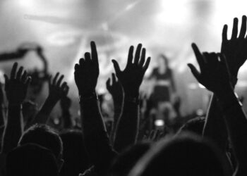Why Do Christians Elevate Their Palms When They Worship God?