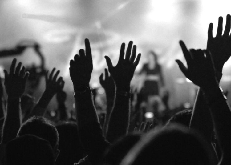 Why Do Christians Elevate Their Palms When They Worship God?